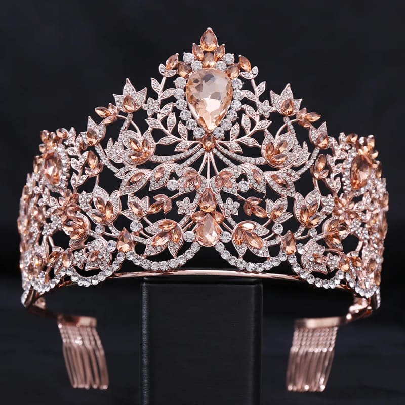Ornate rose gold and diamond tiara with intricate floral designs.