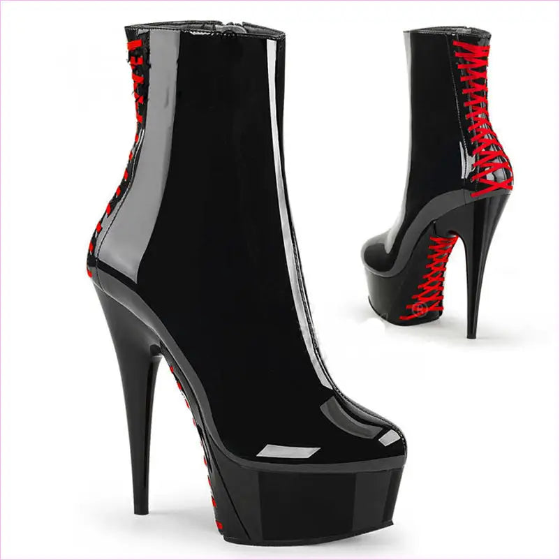 High-heeled platform ankle boots with black patent leather and red lacing details.