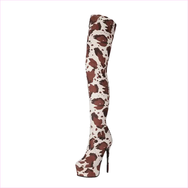 Thigh-high stiletto boot with a cow print pattern.