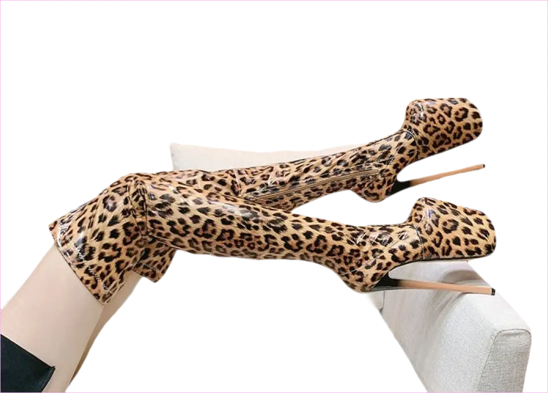 Leopard-print bodysuit or costume stretched across a white couch.