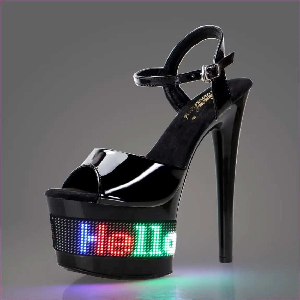 High-heeled platform sandal with a light-up LED display on the base.