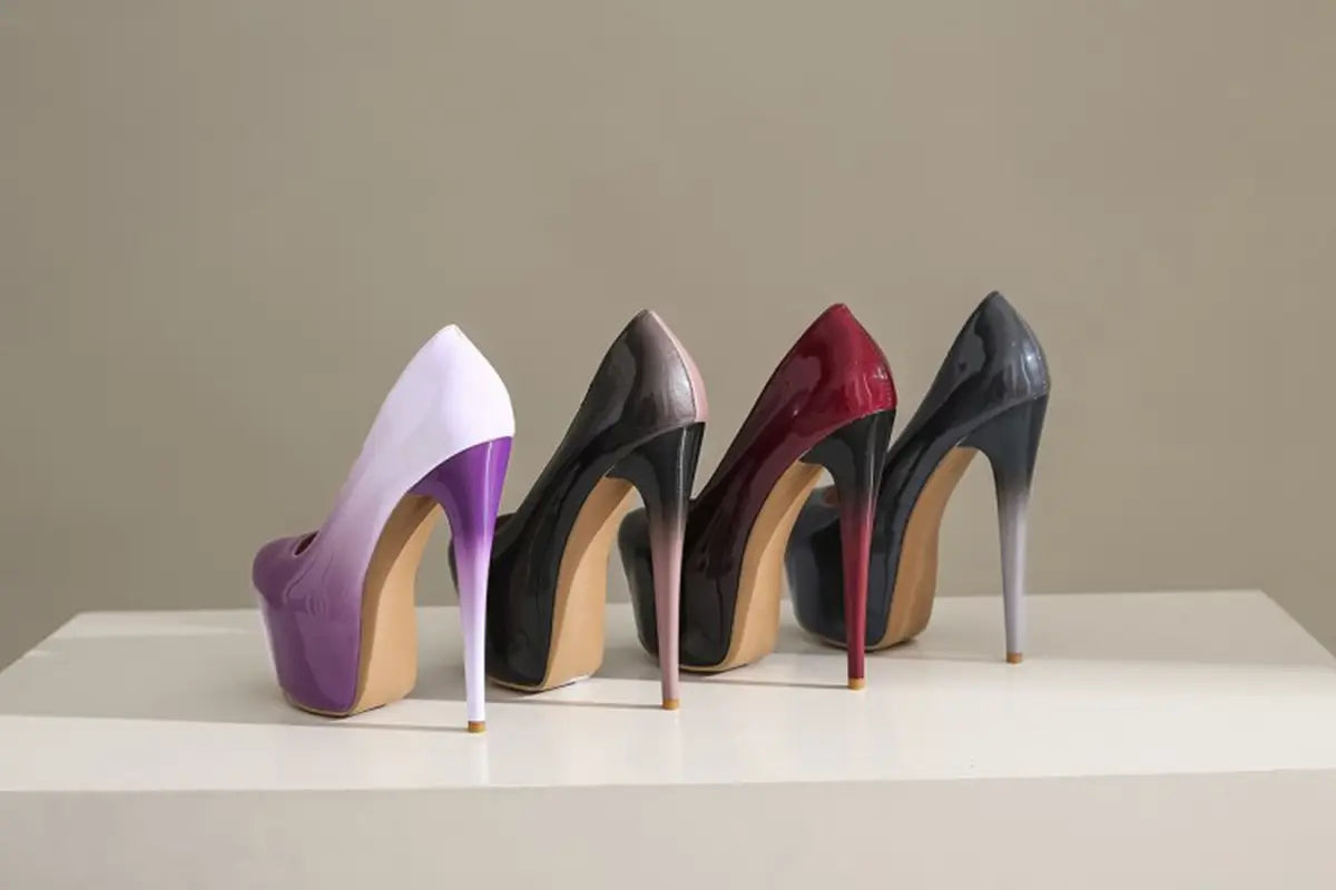 Four stylish high-heeled pumps in purple, taupe, red, and black for drag queen shoes.