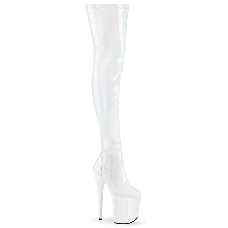 White patent leather thigh-length boots with a tall heel and shiny black accents.