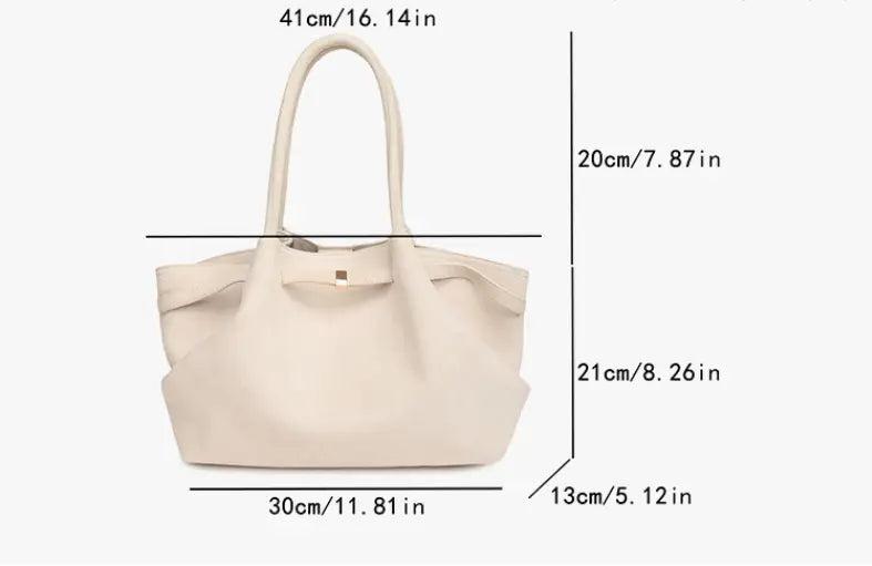 Stylish suede tote bag with impressive large capacity and comfy handles for modern women.