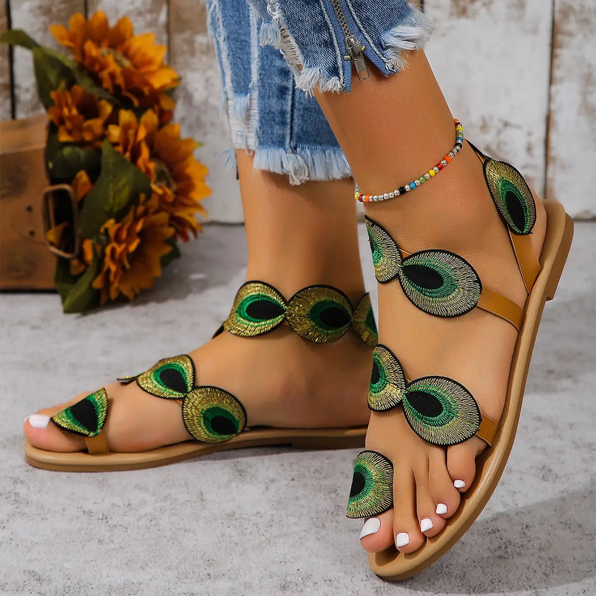 Flat sandals with beautiful peacock pattern embroidered in green and gold embellishments