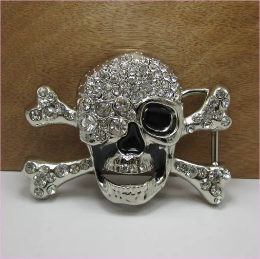 Bejeweled silver skull and crossbones belt buckle.
