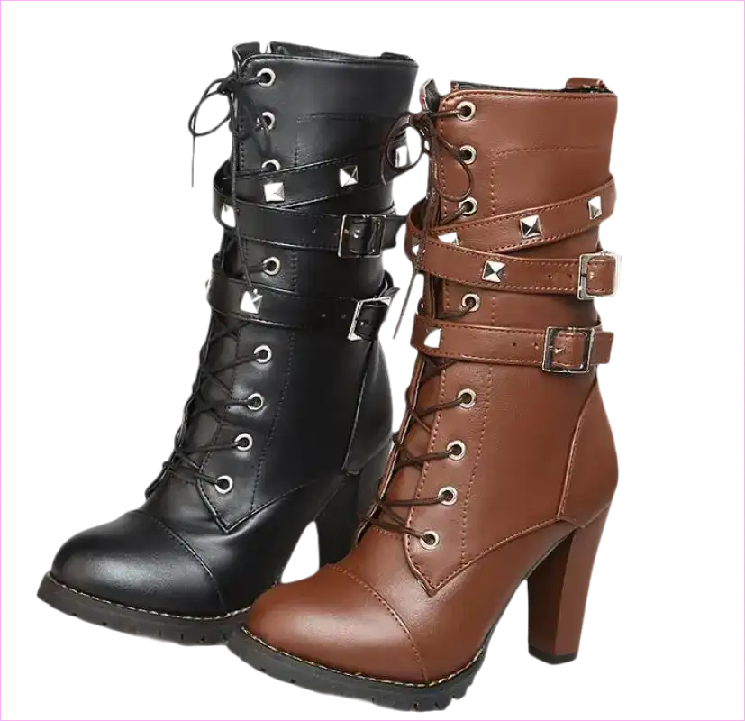 Pair of high-heeled combat-style boots in black and brown leather with laces, buckles, and studs.