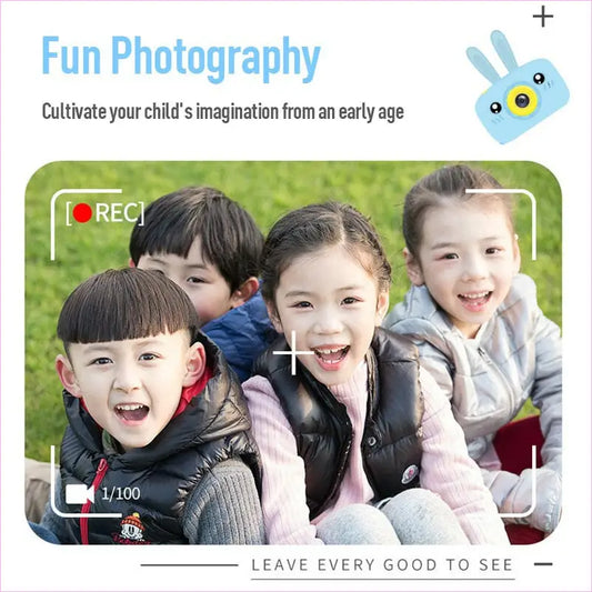 Photograph of four smiling children posing together.