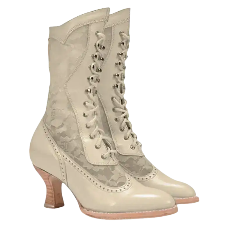 Pair of vintage-style lace-up boots with a curved heel and decorative perforations.