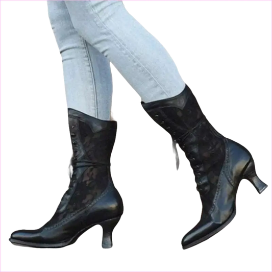 Black leather mid-calf boots with laces and curved heels.