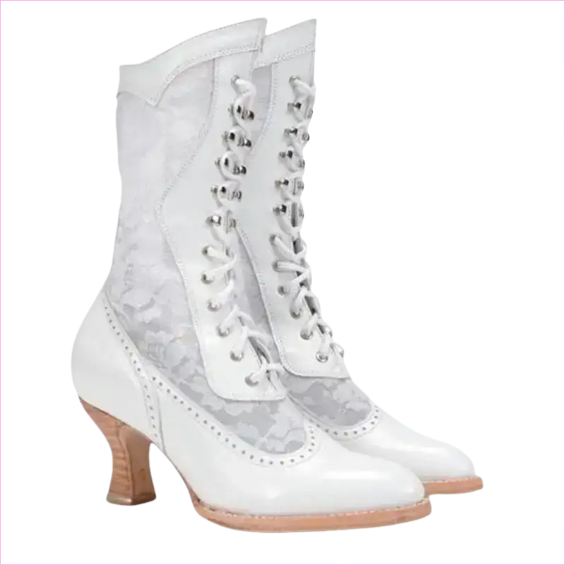 White Victorian-style lace-up boots with a curved heel and decorative perforations.