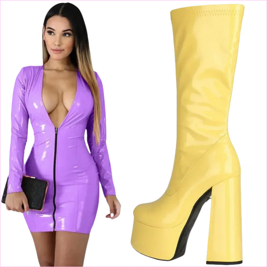 Woman wearing a tight purple latex mini dress with a plunging neckline and long sleeves.