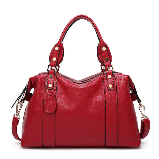 Pleasures and Sins large capacity ladies handbag in red with stylish design and dual straps