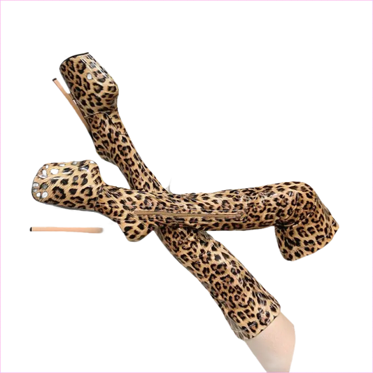 Leopard-print thigh-high boots with extremely high stiletto heels.