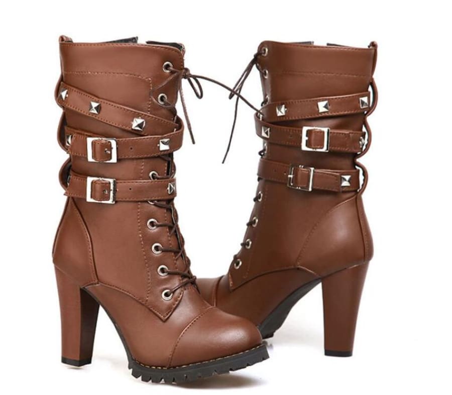 Pair of brown leather high-heeled combat boots with buckles and studs.