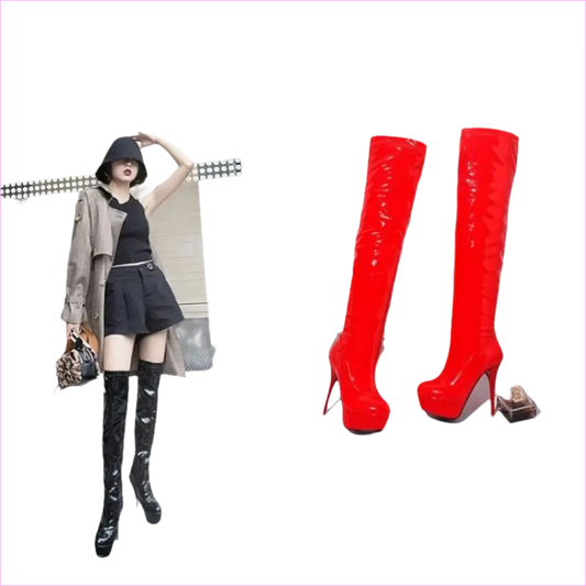 Pair of bright red thigh-high stiletto boots with platform soles.