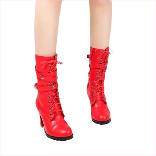 Pair of bright red high-heeled lace-up boots with buckle details and chunky soles.