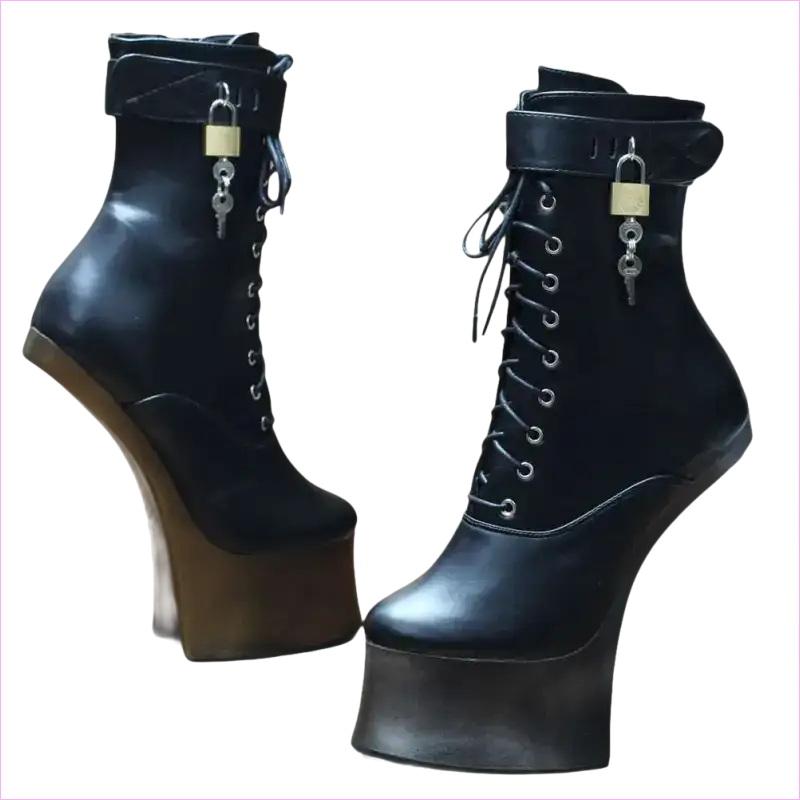 Pair of black high-heeled platform boots with laces and padlocks.