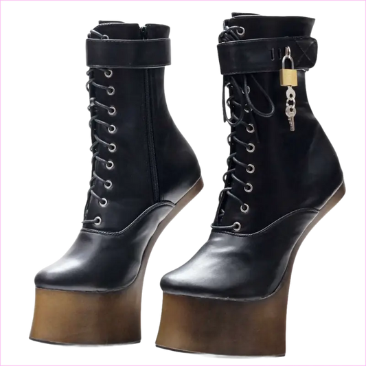 Pair of black leather platform boots with laces and a padlock accessory.
