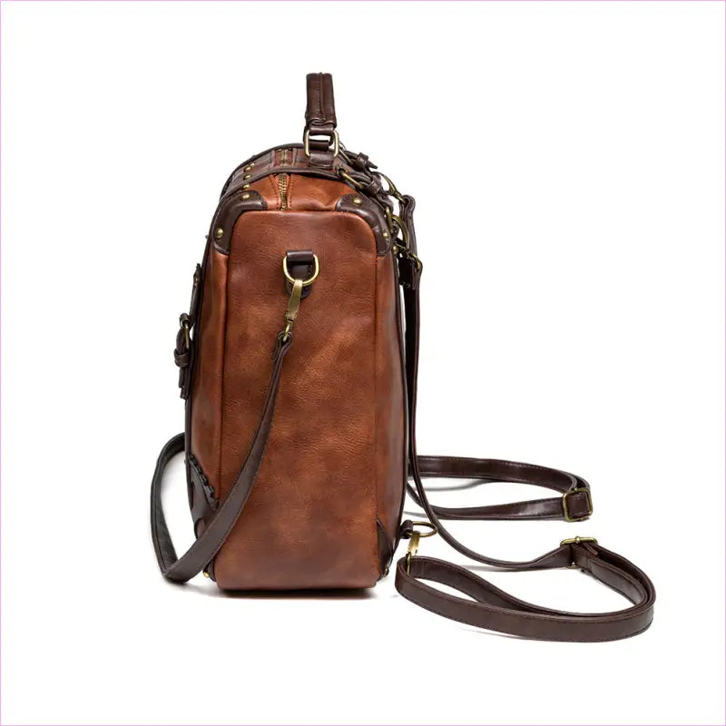 Vintage-style leather backpack with steampunk gear decorations and multiple carrying options.